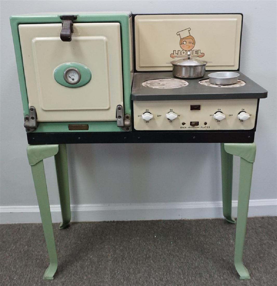 LIONEL PORCELAIN STOVE: Lionel Porcelain Play Stove. One of the many side projects the famous model train company pursued to appeal to the little girls of the period. This green and cream porcelain stove on steel legs featur