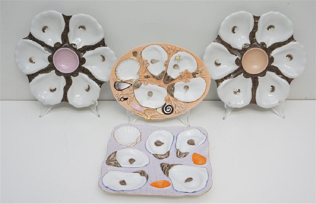 4 JEANNE REED'S + OYSTER PLATES: 4 Contemporary Oyster Plates. 2 Jeanne Reed's Oyster Plates for the Preservation Society of Newport County. Each 9 1/4"x9 1/4". Also 2 Two's Company Oyster Plates Oval at 8 1/4" and Square 8"x8". Weig