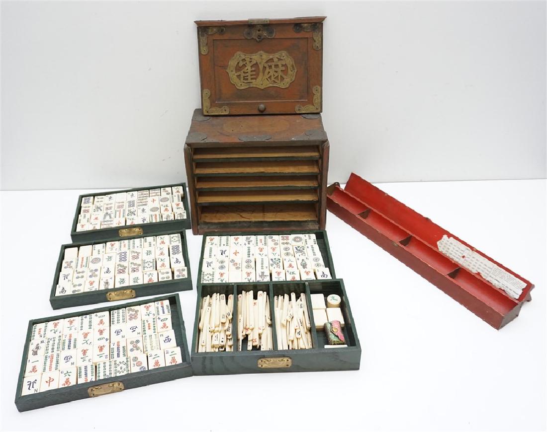 VINTAGE 1920s MAHJONG SET: Vintage 1920s Mahjong Set in a 5-drawer wooden case. 144 Tiles plus dice etc. Polychrome Bone with Bamboo Wood Backs. Wood Box with Brass Accents. Missing two accents. 3 drawers missing Pulls. Two til