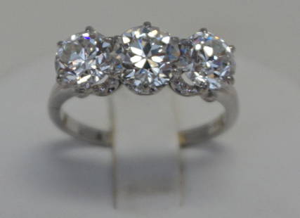 PLATINUM THREE DIAMOND RING (4.00CTS/TW): Gorgeous 1930's art deco ladyÂ’s platinum three stone diamond ring. The ring was purchased at Tiffany & Co.* in the mid 1930's and features three (3), six prong set, Old European cut diamonds set i