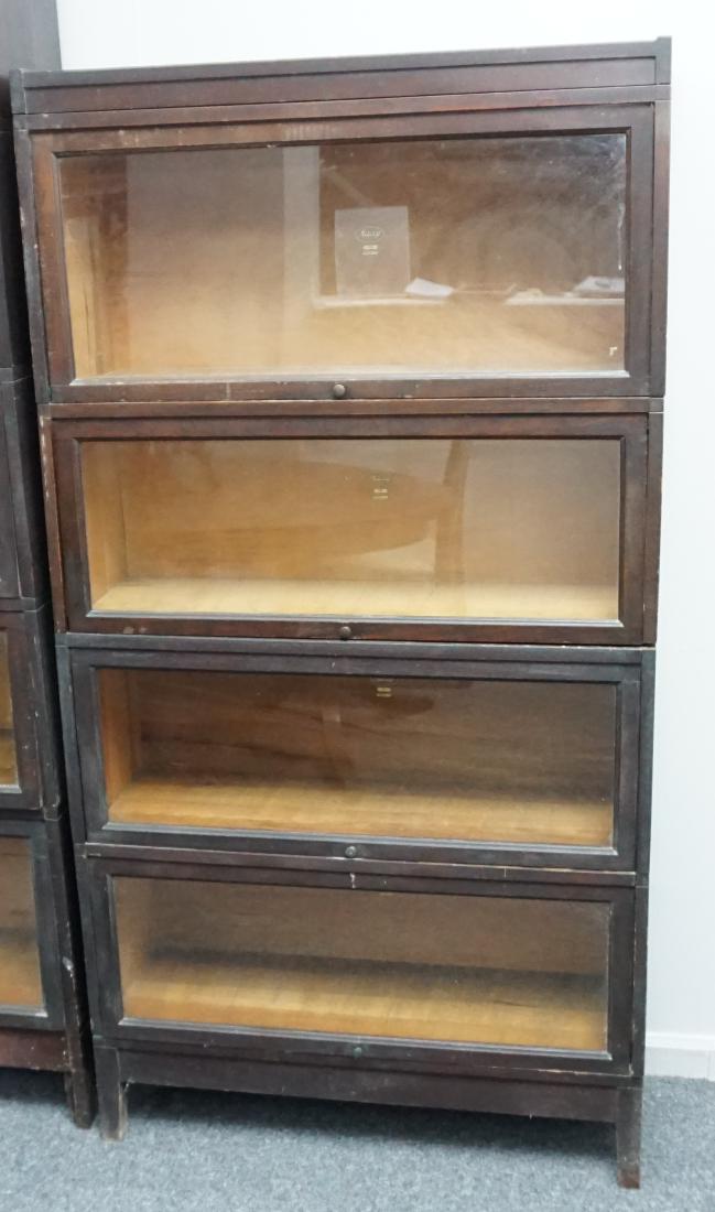 MACEY 4 STACK BARRISTER BOOKCASE: Tall Macey 4 Stack Arts & Crafts Era c. 1900-1910 Dark Oak Barrister Bookcase with top. Top unit is Shaw Walker. Measures 34"x11"x64". PROVENANCE: A Charleston SC Private Estate **Pickup only or Shipp