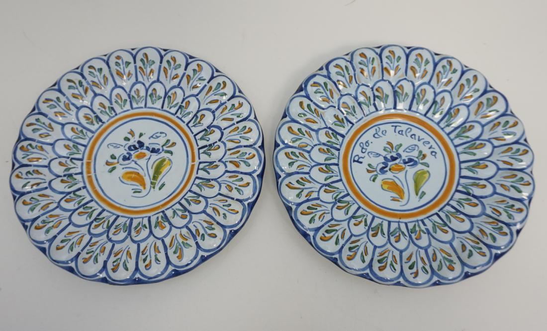2 TALAVERA DE LA REINA SPAIN WALL PLATES: A matched pair of Vintage Talavera de la Reina Spain Wall Plates. Both have a raised flower petal design and are painted in the traditional Spanish colors. One reads Rdo. de Talavera to front, both ar