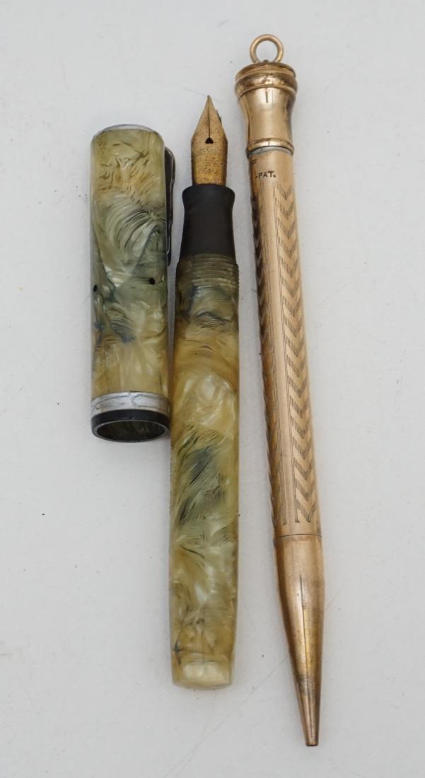 2 pc WATERMAN'S FOUNTAIN PEN & GF PENCIL: 1- Top of the line Waterman's Lady Patrician celluloid fountain pen from the late 1920s. Lever filler in the Persian finish with chrome plated trim. Extra fine full flex gold Ideal nib gives excellent