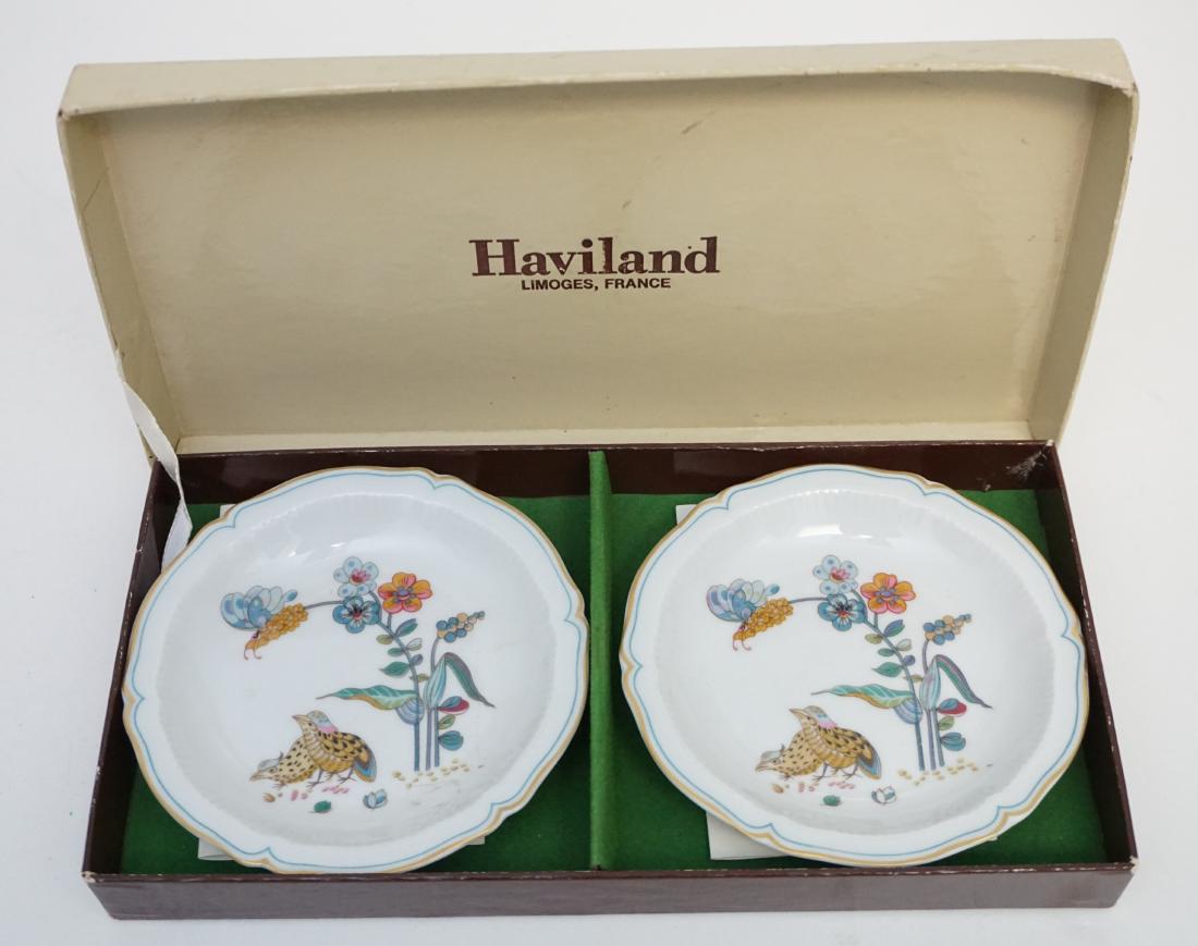 2 HAVILAND LIMOGES GOLDEN QUAIL DISHES: A pair of Vintage Golden Quail Small Trinket / Coaster Dishes. In the original box, the dishes ar in excellent condition. Each 4 1/4". In box 9 1/2"x5"x1". Weight 9 oz. PROVENANCE: A Charleston SC Pri