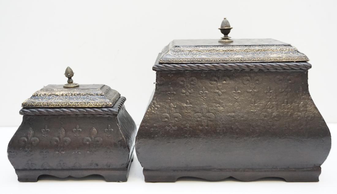 2PC DECORATIVE BOXES: Two 20th C. Decorative Boxes. Stylized Fleur de Lis exterior, felt lined. One at 10 1/4"x8 1/4"x9 and the other 6"x4"x6 1/2". Weight 5 pds 5 oz. PROVENANCE: A Charleston SC Private Estate.