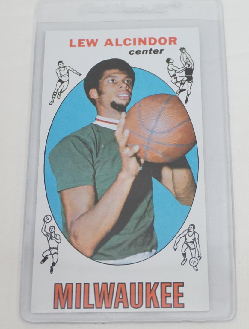 1969 TOPPS #25 LEW ALCINDOR (KAREEM ABDUL-JABBAR): Vintage 1969 Topps #25 Lew Alcindor (Kareem Abdul-Jabbar) 1st season card with the Milwaukee Bucks. Very good condition. PROVENANCE: A Private Charleston SC Estate. These cards are part of a very larg