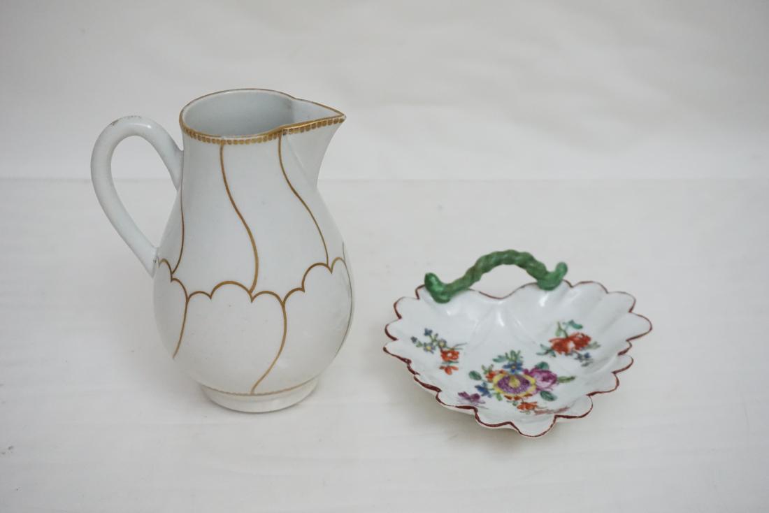 2 18th c LONGTON HALL & WORCESTER PORCELAIN: 1- Rare 18th Century Longton Hall leaf shaped pickle dish, with green glazed twisted loop handle, painted in colored enamels in 'Trembly Rose Painter ' style with a spray of flowers and leaves, and sc
