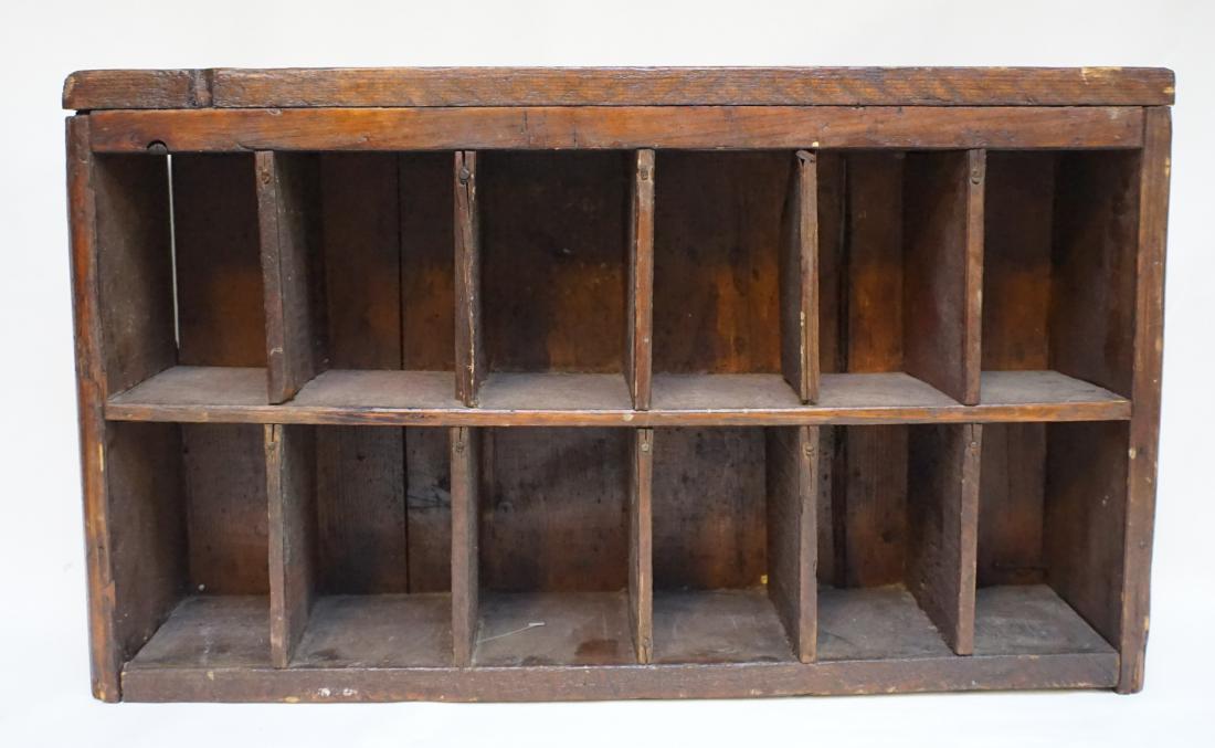 ANTIQUE POST OFFCE MAIL SORTER: Antique American Post Office Mail Sorter. Great for use on a wall to display smal treasures. Measures 23 x 5.5 x 13.5 Tall. PROVENANCE: A Charleston SC Estate.*** Weight 8 pds.