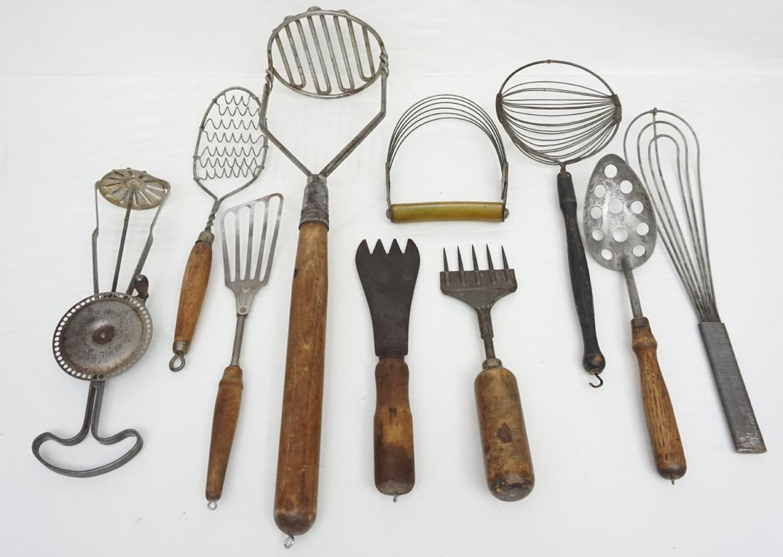 10 ANTIQUE PRIMITIVE KITCHEN UTENSILS: 10 Antique Primitive Kitchen Utensil Lot. Including a large 18" potato masher and a Washburn Company Turbine Egg Beater. Great early kitchen utensils, perfect for display. Weight on all 3 pds 5 oz.