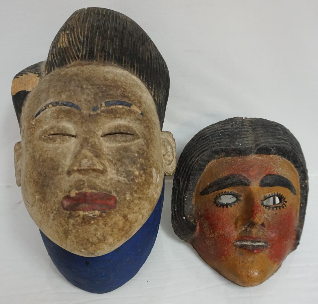 2 ANTIQUE MASKS YORUBA +: Two Masks. The first a Yoruba Mask purchased at the Totem Meneghelli Gallery in downtown Johannesburg c 1970. Paint loss one side. 10"x6"x6". The other is a Antique Paper Mache and Gesso Mask 6"x7 1/4
