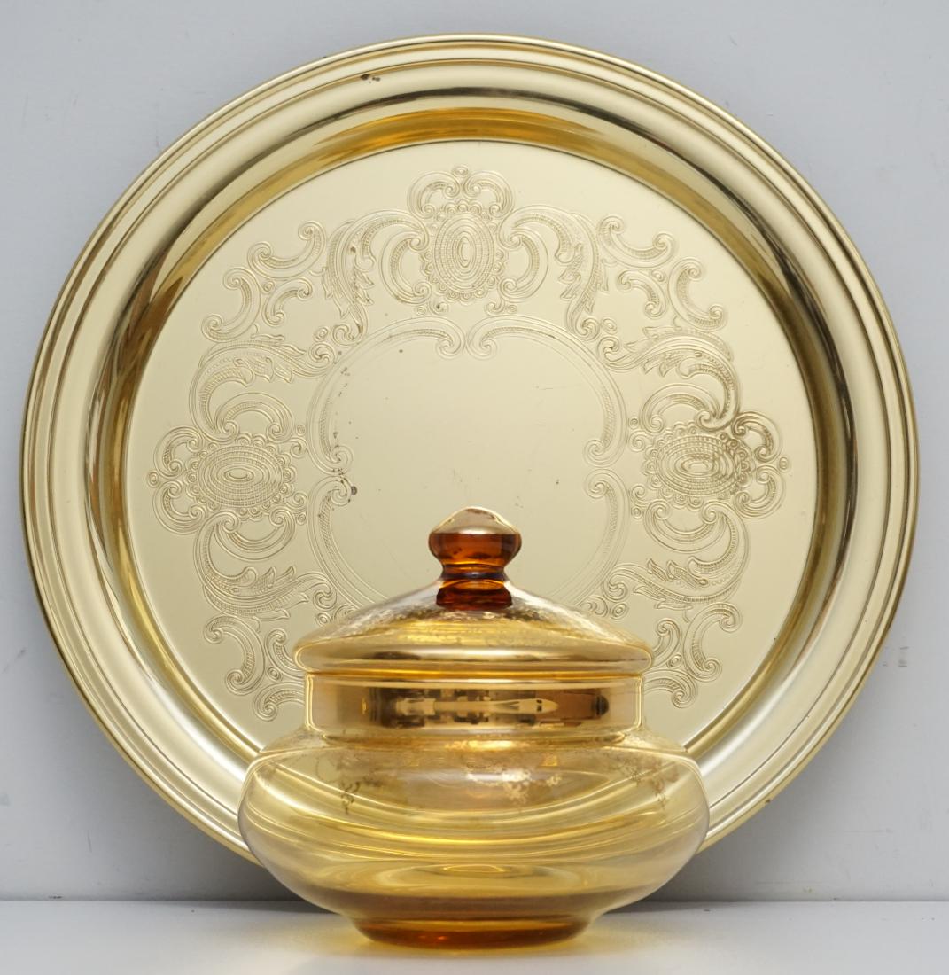 2 pc MID CENTURY MURANO GLASS & BRASS TRAY: 1- Laguna Murano Glass Covered Candy Dish, gold enameled flowers. Measures 5 1/4"x5 1/2"x5 3/4". 2- Good Baldwin Brass Tray, measures 12 1/4"x12 1/4". Weight on all 2 pds. PROVENANCE: A Private South