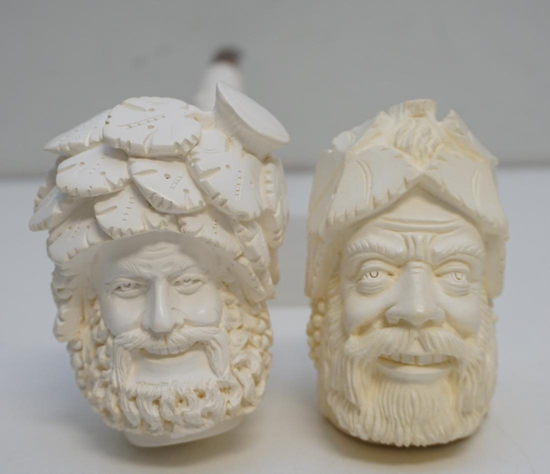 2 MEERSCHAUM CARVED BACCHUS PIPES: Both pipes are in excellent unused condition in original cases. 1- Long Bacchus Meerschaum Pipe 15". 2- CAO Bacchus Meerschaum Pipe 8". These carvings, like all Meerschaums is from a single block and
