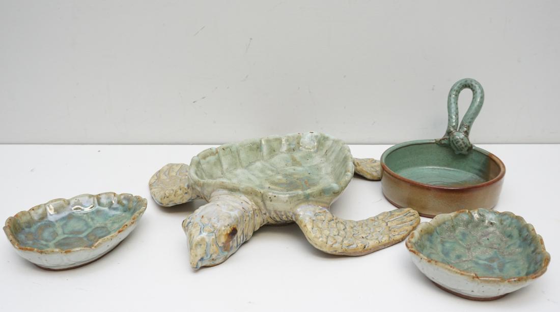 STEVEN NEDZA TURTLE SERVING SET-4PC TOTAL: Four Pieces of Handcrafted Studio Pottery. Three pieces signed by artist Steven Nedza. Sea Turtle Chip Dish 14"x14"x2 1/2". Two Sea Turtle Shell Dip Dishes 6"x5"x1 1/4". Turtle Handle Dish 6 1/2"x6"x4
