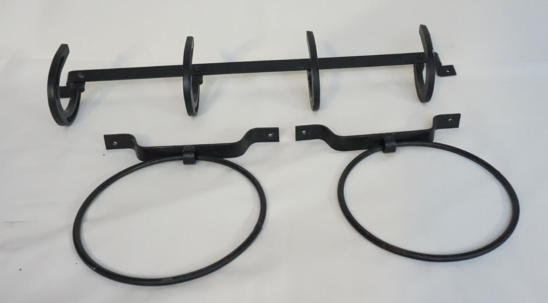 HORSESHOE COAT RACK & TOWEL RACKS: Metal Horseshoe Coat Rack with 4 Horseshoes and 2 Cast Iron Towel Racks. Measures 3.5 x 4" at horse shoe x 22" long. Round towel racks measure 7.5" across. Weight on all 2 pds 6 oz.