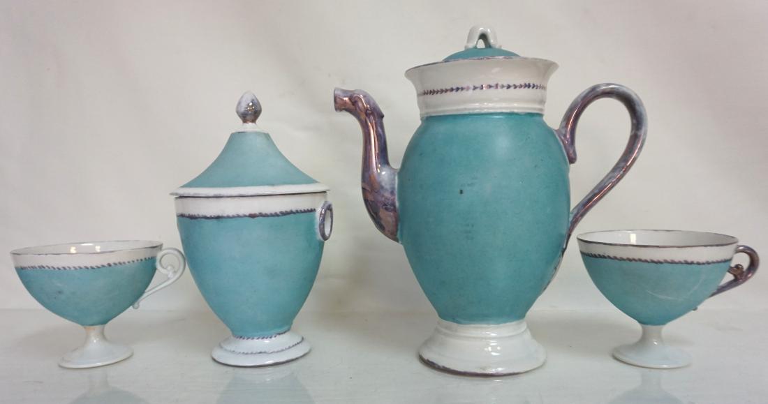 4 pc ART DECO COFFEE SET: 4 Piece Art Deco Coffee Set. Blue and White with Luster Accents. Coffee 8 1/2". Weight on all 2 pds 7 oz. PROVENANCE: A Private Charleston SC Estate.