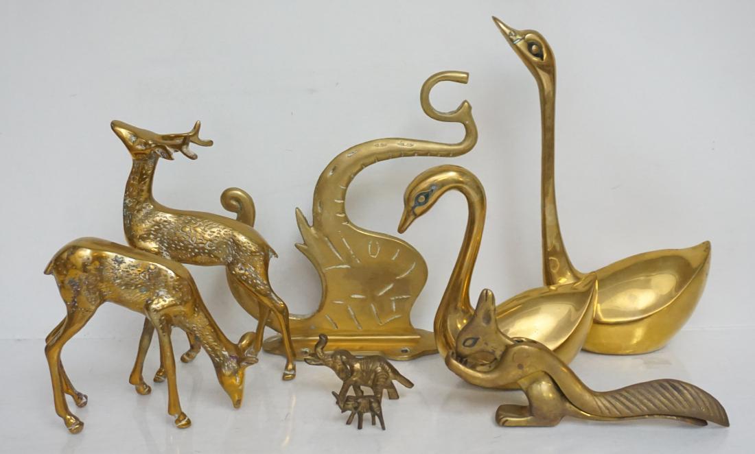 8 pc MID CENTURY BRASS ANIMALS: Lot of 8 Mid Century Brass Animal Accents. Includes a Vintage Brass Squirrel Nutcracker 2 Brass Ducks, 2 Small Elephants, 2 Brass Deer and a Brass Elephant Wall Hook. Tallest duck 9 1/4". Weight on al