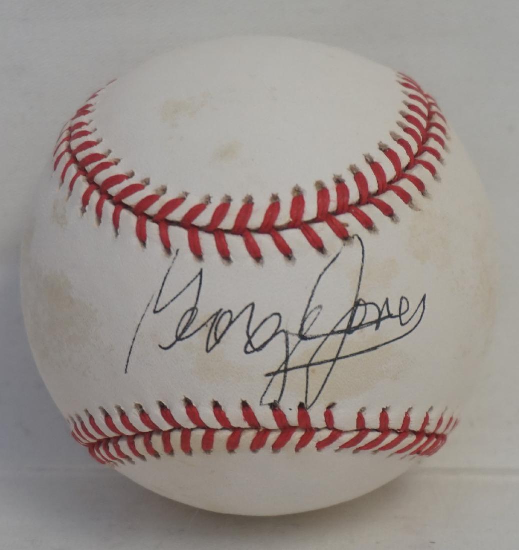 GEORGE JONES SIGNED MLB BASEBALL: George Jones Autographed MLB Baseball. Country Music Legend. In plexiglass case. Weight 9.3 oz. PROVENANCE: A Private Charleston SC Estate. Part of a very large and extensive 60 year sports, comic, ce