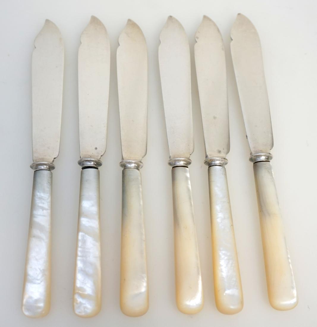 6 ENGLISH STERLING FISH KINVES: Six Antique English Sterling Silver Fish Knives with MOP handles. Made by Walker & Hall, Sheffield c. 1892. Weight 12.6 oz. PROVENANCE: A Private Charleston SC Estate.