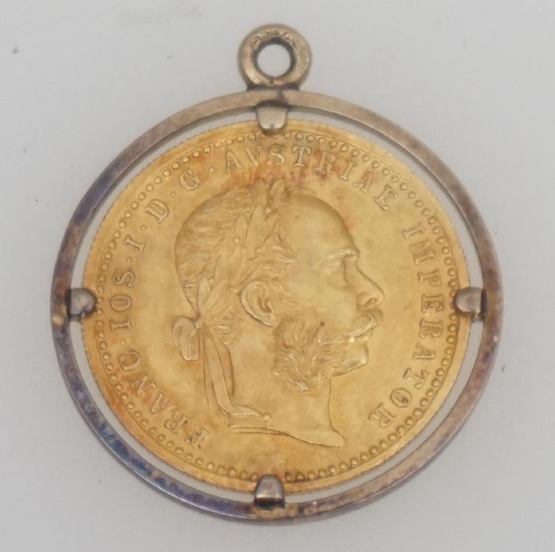1915 AUSTRIA GOLD DUCAT PENDANT: Austrian Gold Ducat, 1915 Pendant. The coin contains 0.1106 troy ounces of gold. Obverse: Laureate head right facing bust of Emperor Franz Joseph I. Reverse: Crowned imperial double headed eagle. 1915