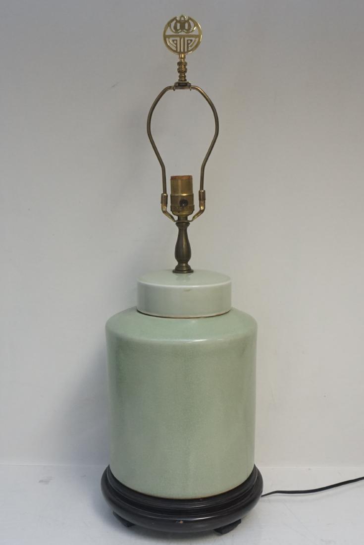 CHINESE CELADON GLAZED JAR LAMP: Chinese Celadon Large Glazed Jar Mounted as a Lamp. Lamp measures 9"x9"x21". With harp 29". Shade 18"x13". Weight 15 pds. PROVENANCE: A Pawleys Island SC Private Estate.****Pickup only or Shipping on 