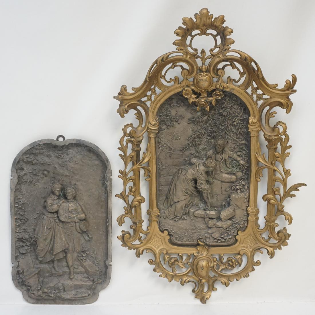 2 BRONZE RELIEF ROMANTIC PLAQUES: Two Antique High Relief Romantic Bronze Plaques. One in gilded brass frame. Plaques 14 1/2"x8 1/2". Frame 24"x14"x3". Weight combined 11 pds 5 oz. PROVENANCE: A Charleston SC Private Estate.