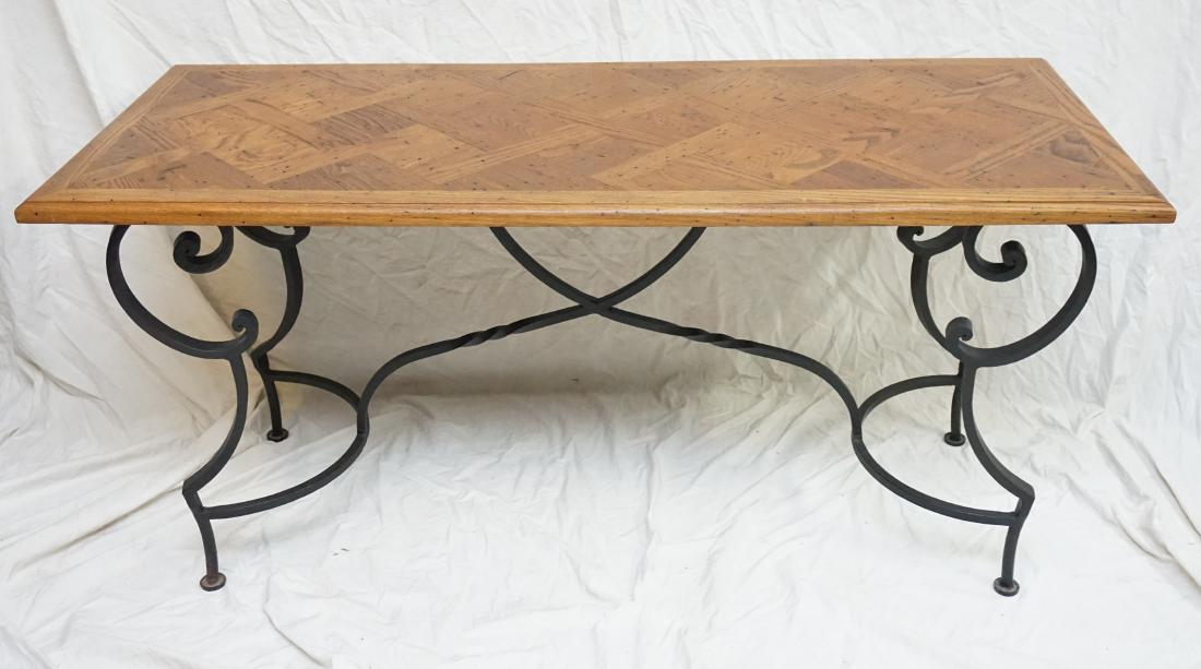 AFTER GILBERT POILLERAT CONSOLE TABLE: After Gilbert Poillerat (1902-1988), Oak Parquetry Console Table with Scrolling Hand Forged Wrought Iron Base. Measures 23 1/2"x59 1/2"x28" tall. PROVENANCE: A Pawleys Island SC Estate. ****Pickup onl