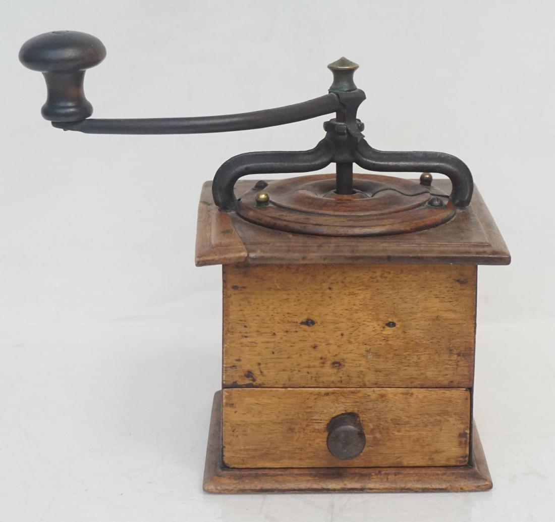 ANTIQUE OAK COFFEE GRINDER: Antique Oak Manual Hand Crank Coffee Grinder. Good condition, great display piece, still grinds. Measures 6"x6"x18". Weight 2 pds 3 oz. PROVENANCE: A Private Charleston SC Estate