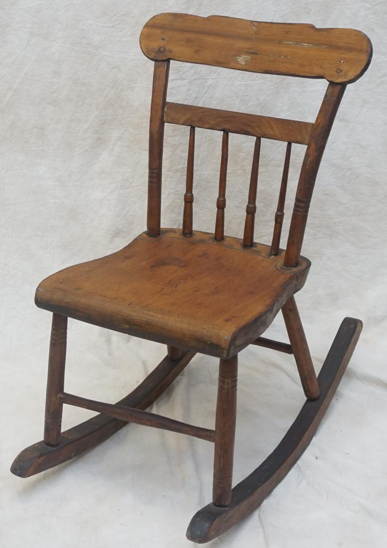 ANTIQUE AMERICAN PINE ROCKING CHAIR: Antique American Pine Small Rocking Chair. Measures 30"x20"x31". PROVENANCE: A Private Charleston SC Estate.*****Pickup only or Shipping on furniture offered through R & B Shipping 404-524-9122, Outwa