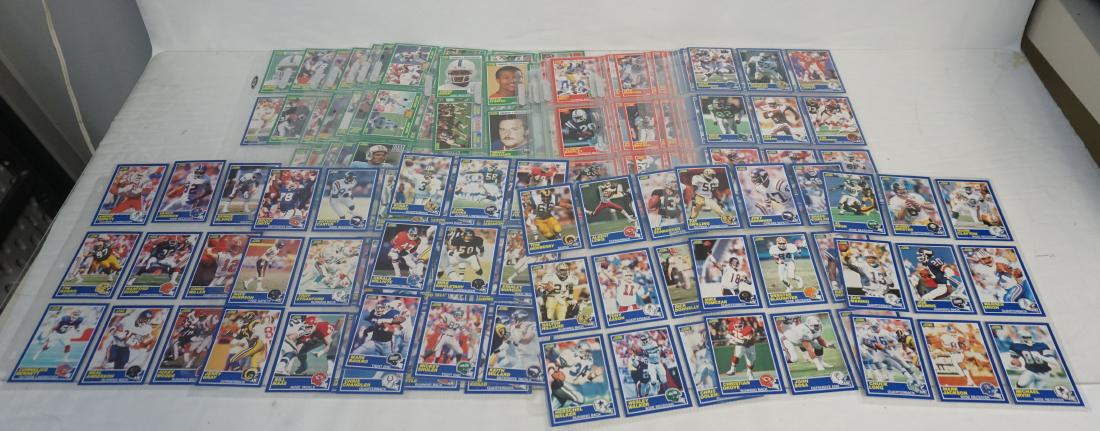 1989 SCORE COMPLETE FOOTBALL CARD SET: Complete Set 330 Cards, 1989 Score Football Cards. All are in protective sleeves in notebook. Excellent condition. Notebook 10"x11 1/2"x1 1/2". Weight 2 pds 12 oz. PROVENANCE: A Private Charleston SC 