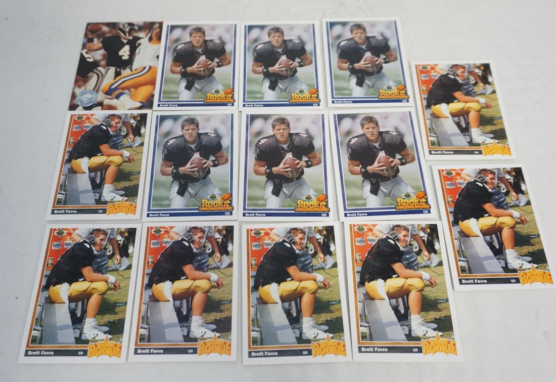 14 1991 BRETT FAVRE ROOKIE CARDS: All are in very good condition. 1- 7 Brett Favre 1991 Upper Deck Football Rookie Card #13. 2- 6 Brett Favre 1991 Upper Deck Atlanta Falcons #647 Rookie Card. 3- 1- Brett Favre 1991 NFL Pro Set Rookie