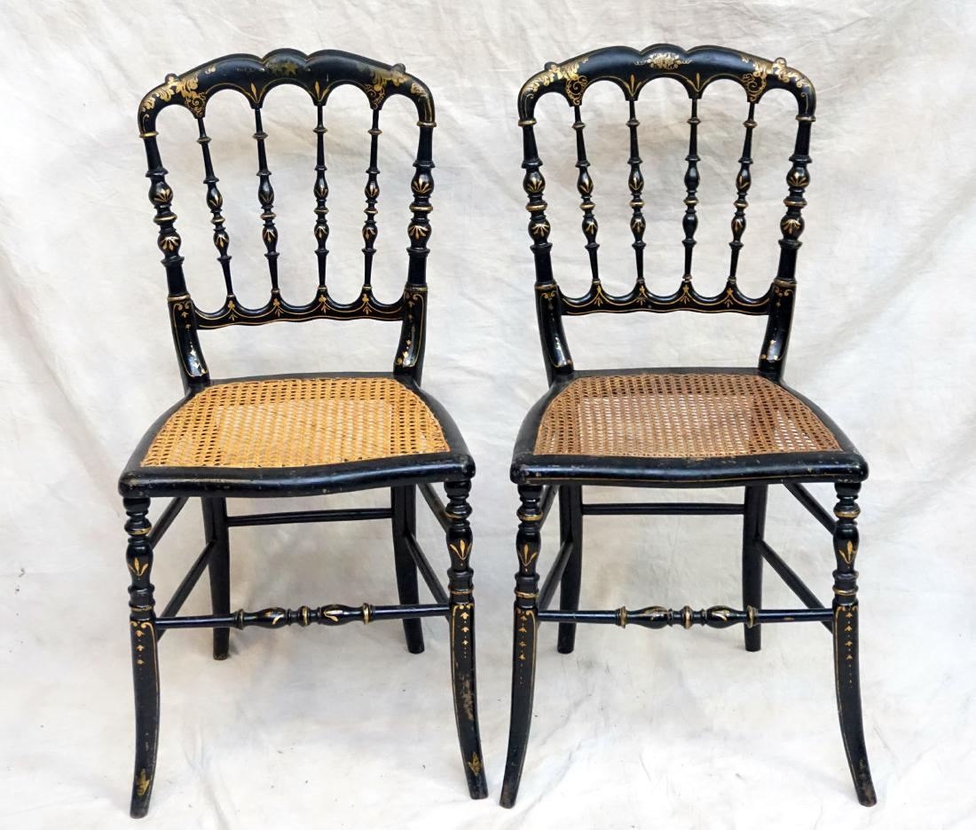 2 NAPOLEONIC CHIAVARI SIDE CHAIRS: Matched pair of Napoleon III Chiavari side chairs. Nicely distressed through age and use. Replaced cane seats.16.50 x 14.50 x 33.50" PROVENANCE: A Private Charleston SC Estate. ***Pickup only or Shipp