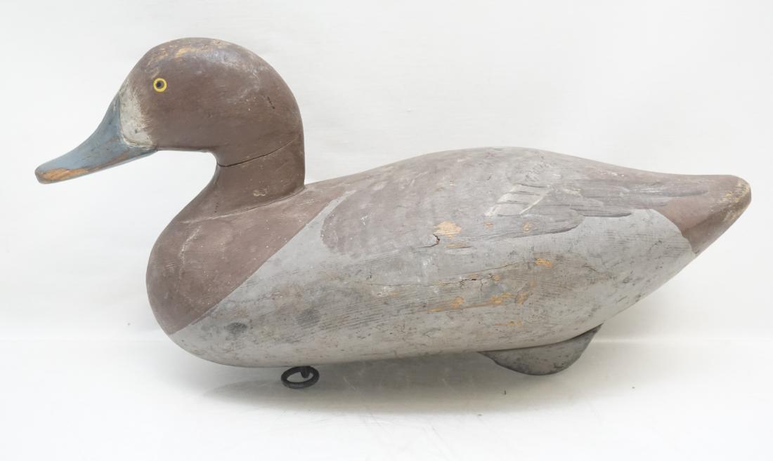 MADISON MITCHELL BLUEBILL HEN: Vintage R. Madison Mitchell (1901-1993), Havre De Grace, Maryland Bluebill Hen Decoy. Original Paint. Rigged with ring and weight. Early model most likely 1950s. Measures 14"x5 1/2"x8". Weight 2 pds 1