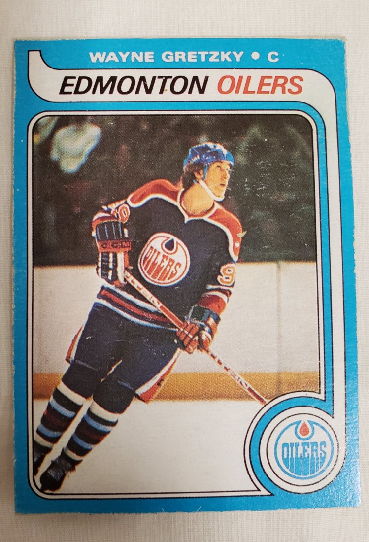 1979-80 O-PEE-CHEE WAYNE GRETZKY ROOKIE CARD: 1979-80 O-Pee-Chee Wayne Gretzky Rookie Card. In excellent condition. In sleeve. PROVENANCE: A Private Charleston SC Estate. Part of a very large and extensive 60 year sports, comic, celebrity, and ba