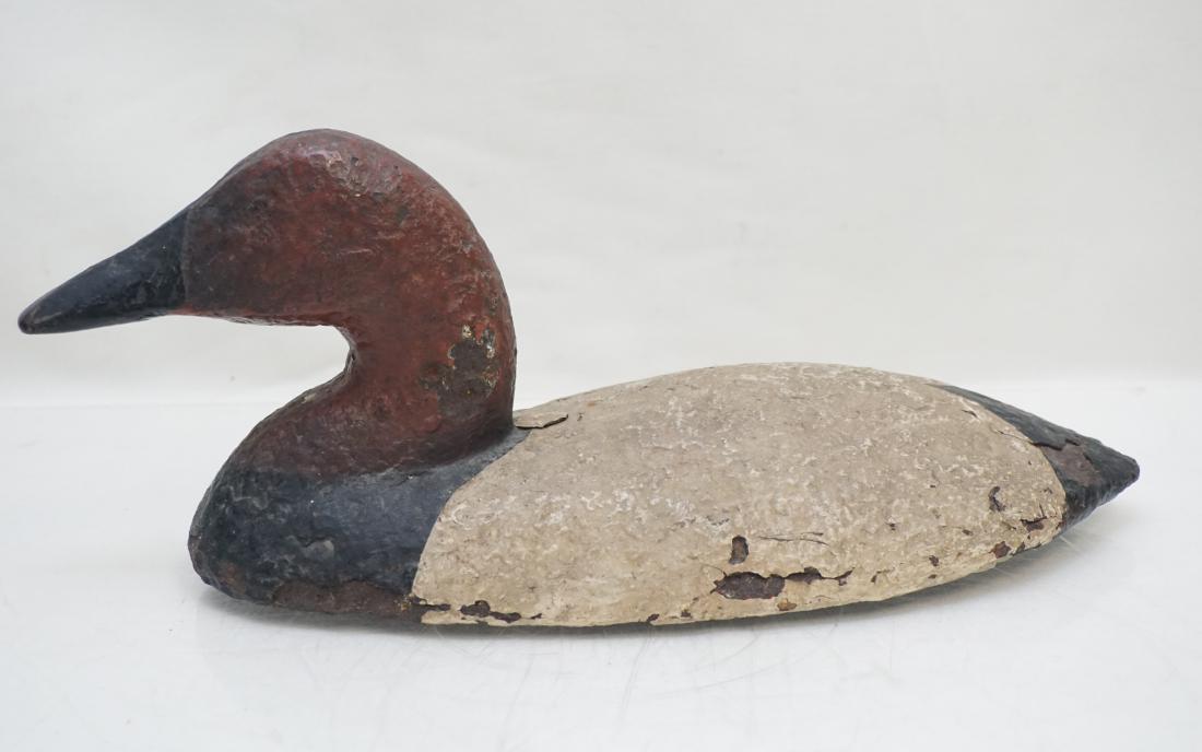 UPPER BAY CANVASBACK IRON SINK BOX: Early 20th c. Upper Bay Canvasback Iron Sink Box. 11"x5"x5 1/2". Weight 16 pds 13 oz. PROVENANCE: The estate of George A. Gehrken, Commission District Game Biologist, Eastern Virginia / Eastern Shore 