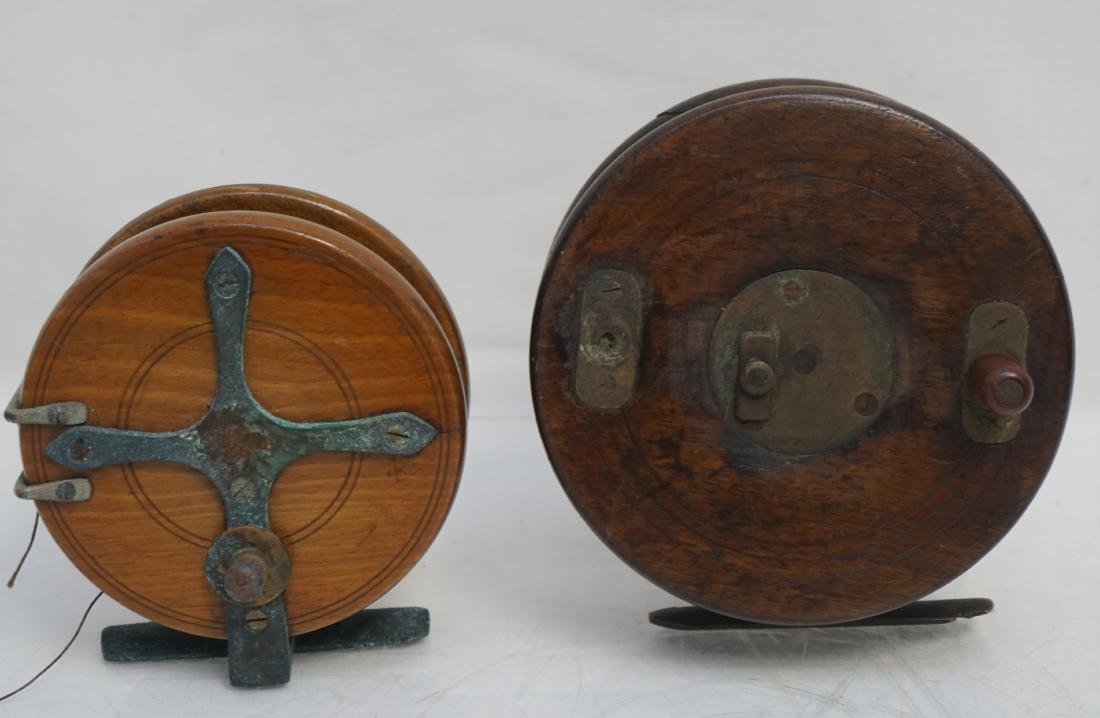 2 VINTAGE STARBACK FLY REELS: 2 Antique Wood Fly Fishing Reels. Both Starbacks with crank handles. One with fishtail starback. Smaller with bone handles, larger missing one handle. Great additions to any collection. Larger 4 1/2",
