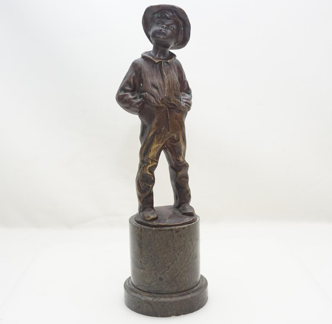 BRONZE BOY SMOKING - FULBORN: A bronze figure of a young boy raised on a round slate plinth. Modelled smoking a cigar, standing with his hands in his pockets. Signed Fulborn. Measures 3 3/4"x3 3/4'x12 1/2". Weight 5 pds 5 oz. PROV