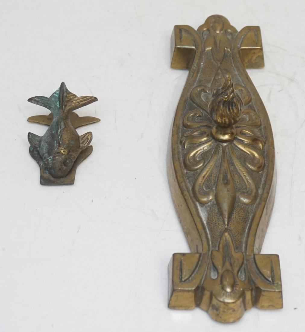 2 pc BRONZE DESK ITEMS: 1- Antique Russell & Erwin Bronze Door Pull or Accent with Flame, now being used as paperweight 9 1/2"x 2 3/4". 2- Koi letter Clip made in China 3 1/4" Weight 3 pds 4 oz. PROVENANCE: A Private Charles