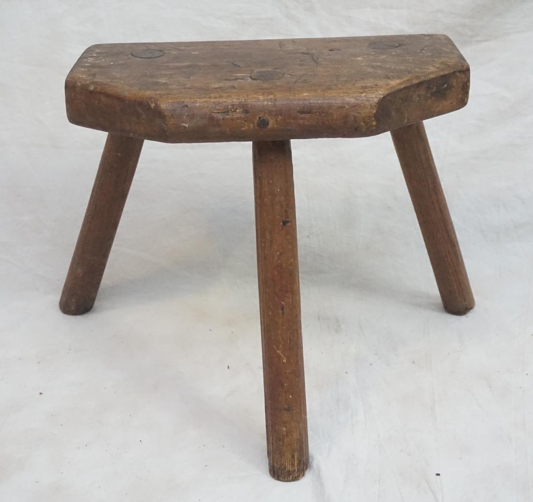 ANTIQUE PRIMITIVE MILK STOOL: Antique Primitive Milk Stool. Pegged construction. Measures 16"x9"x12". Weight 3 pds.PROVENANCE: A Private Charleston SC Estate.
