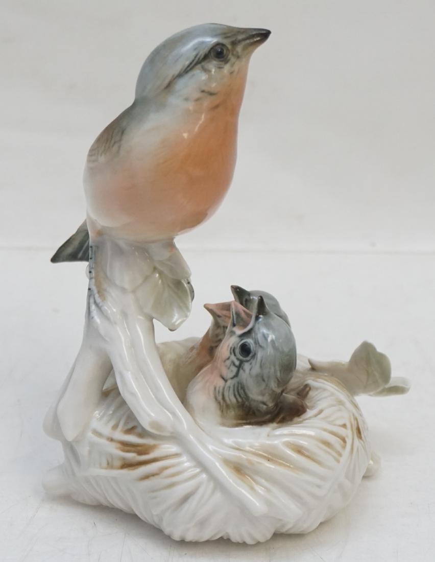 KARL ENS GERMAN PORCELAIN FINCH W BABIES: Figural Finch with Babies in Nest from the German Firm of Porzellanfabrik Karl Ens, modelled in a very naturalistic fashion. #7579, in very good condition. Magnificent color and fine detail. Mark used