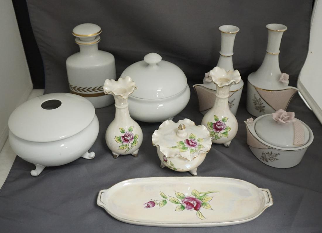 10 pc. VINTAGE PORCELAIN DRESSER ITEMS: 4 Piece Lipper Mann Porcelain Dresset set. Tray, 2 vases and trinket box, hairline to tray. 3 piece Pink Rose Set, 2 bottles, 1 trinket. 2 piece whote Czech Porcelain Powder Box and Hair Receiver. Col