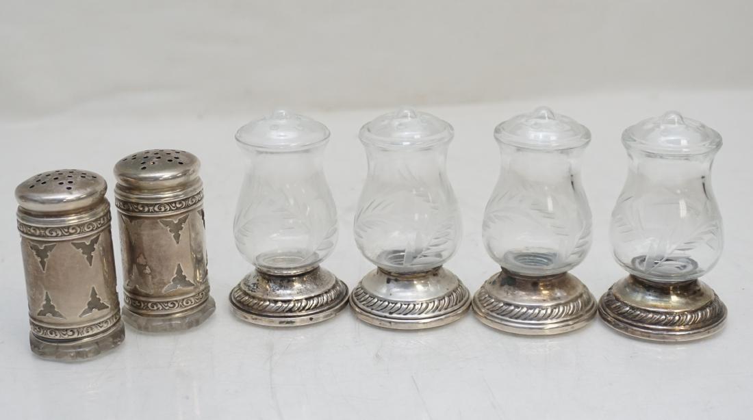 6 STERLING & CRYSTAL SALT SHAKERS: Four Matching Etched Glass Salt Shakers with Sterling Bases 2 3/4". Two Antique Stering Cased Crystal Shakers 2 1/4" - chip to bottom of one, Weight 10.7 oz. PROVENANCE: A Private Charleston SC Estate