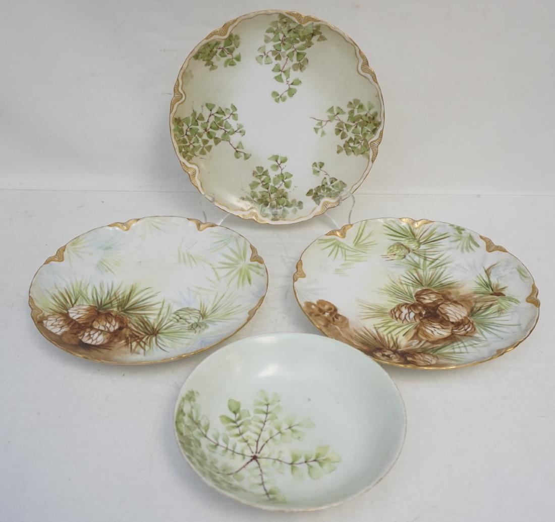 4 HAVILAND LIMOGES DISHES: Four pieces of Haviland Limoges Porcelain. 2 matching pine cone plates 7 1/2" and matching plate 7 1/2" and bowl 5 1/2". Weight on all 1 pd 11 oz. PROVENANCE: A Private Charleston SC Estate.