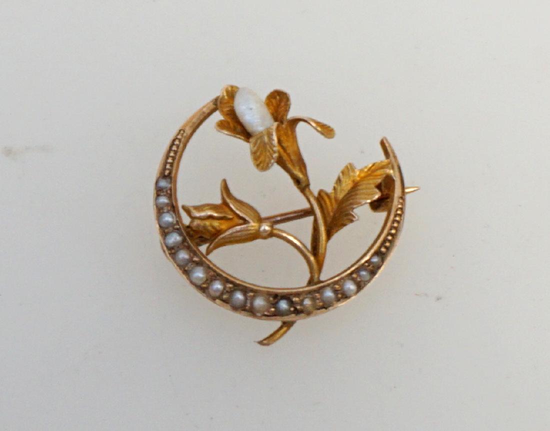 EDWARDIAN 14K PEARL LILY BROOCH: Edwardian 14k Crescent Moon with seed Pearls and Lily with Pearl Brooch. Measures 3/4", weighs 1.9 grams (1.2 dwt). PROVENANCE: A Private Charleston SC Estate.
