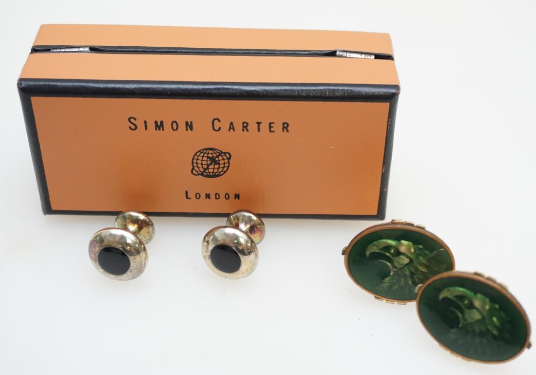 SIMON CARTER & SWANK EAGLE CUFFLINKS: Both in good condition 1- Vintage 1960s Swank Intaglio Eagle Cufflinks in Green. 2- Simon Carter London Silverplate and Onyx in the Original Box. Weight on all 3 oz. PROVENANCE: A Private Charleston S