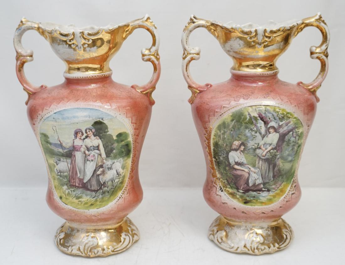 PAIR CZECH PORCELAIN VASES: Antique Czech Transferware Porcelain Vases. Pink with gilding,center medallion transfers with farm maidens. Heavy wear to gilt, hairline to one inside lip. Each 13 1/2". Weight combined 5 pds. PROVENA