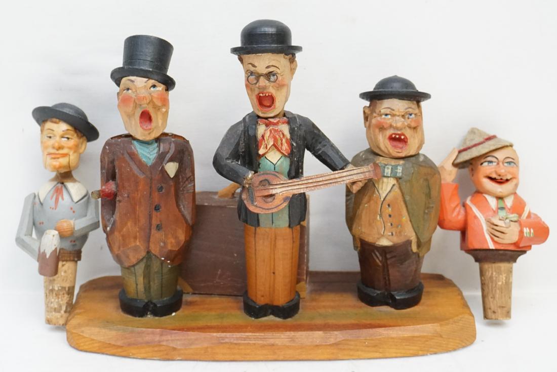 GERMAN CARVED ANRI BAR SINGERS + STOPPERS: Vintage Hand Carved German Anri Group. Bar Set "The Merry Widow" Music Box with 3 Singers. Heads lift for cork stopper, bottle opener and corkscrew, banjo player missing hand 9"x8". Plus two articulat
