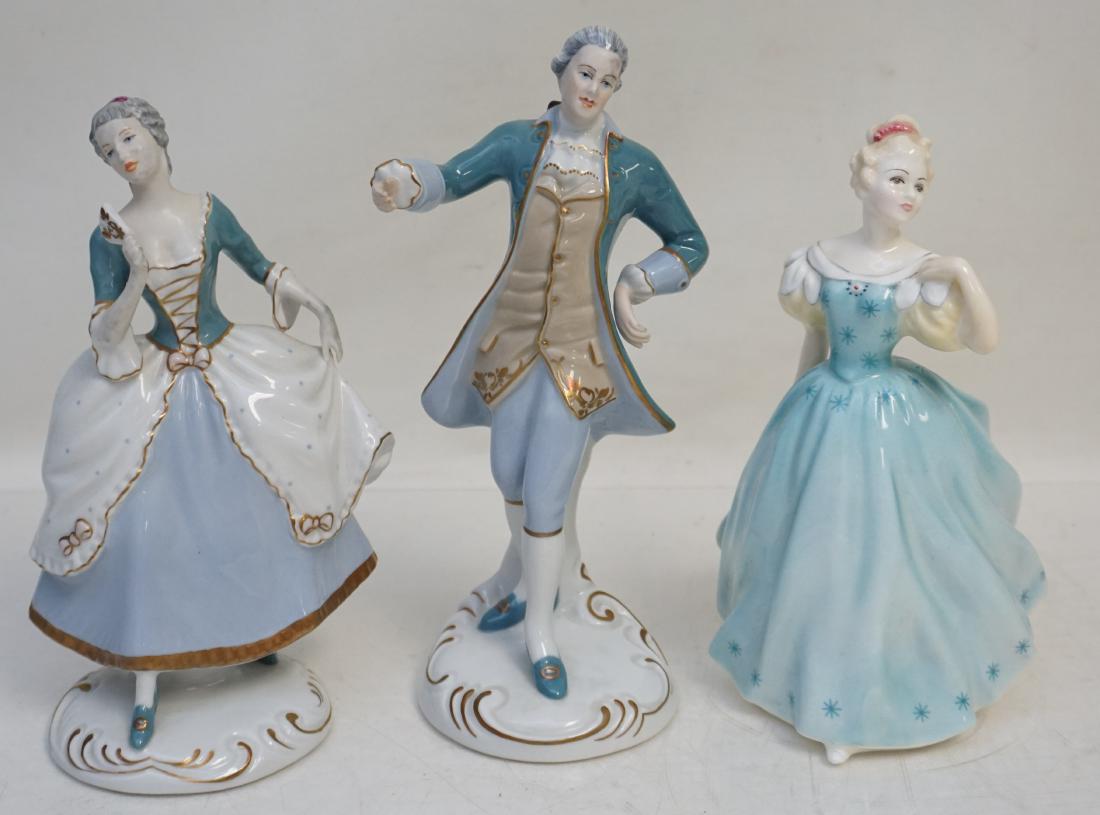 3 PC ROYAL DUX & ROYAL DOULTON FIGURINES: All are vintage and in good condition. 1- Royal Doulton Enchantment Figurine 8". 2- Pair of Royal Dux Aristocratic couple Figurines. 9". Weight 2 pds 12 oz. PROVENANCE: A Private Charleston SC Estate.