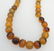 2 VINTAGE BALTIC AMBER NECKLACE + - 5