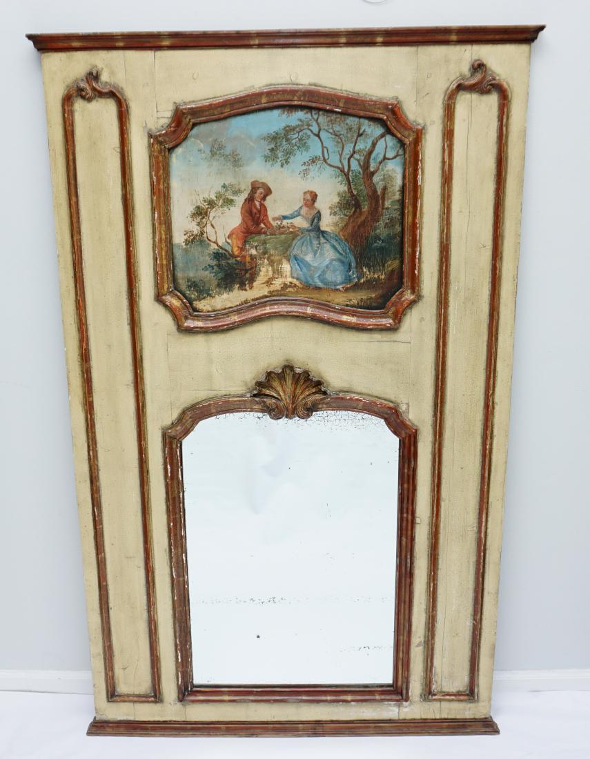 ANTIQUE FRENCH TRUMEAU MIRROR w/ OIL PAINTING: Antique French Louis XV Trumeau Mirror with Oil Painting. Distressed cream with painted gilded carvings. The stepped pediment surmounting an oil painted cartouche depicting a courting couple in a buco