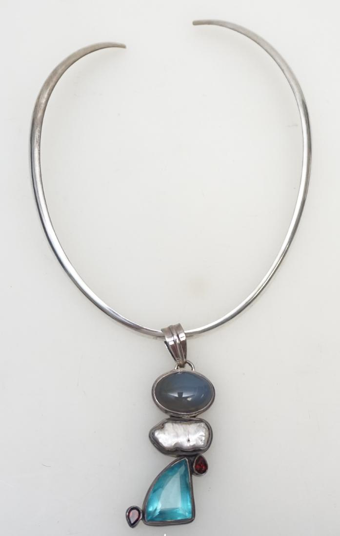 STERLING CHOKER W LARGE GEMSTONE PENDANT: Sterling Silver Choker with Large 2 1/2" Gemstone Pendant.Weight 50 grams. PROVENANCE: A Private Charleston SC Estate.